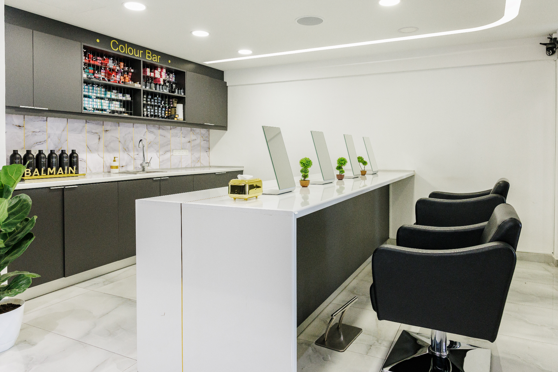 Styling counter next to the Color Bar with Balmain aftercare display