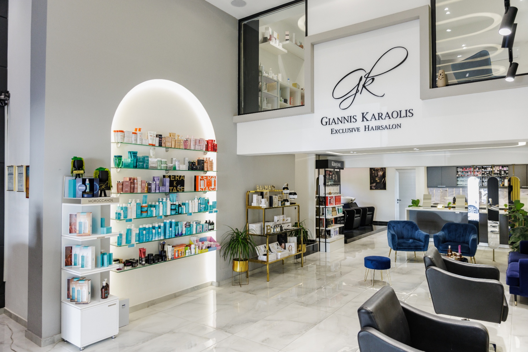 Reception and retail lounge at Giannis Karaolis Exclusive Hairsalon