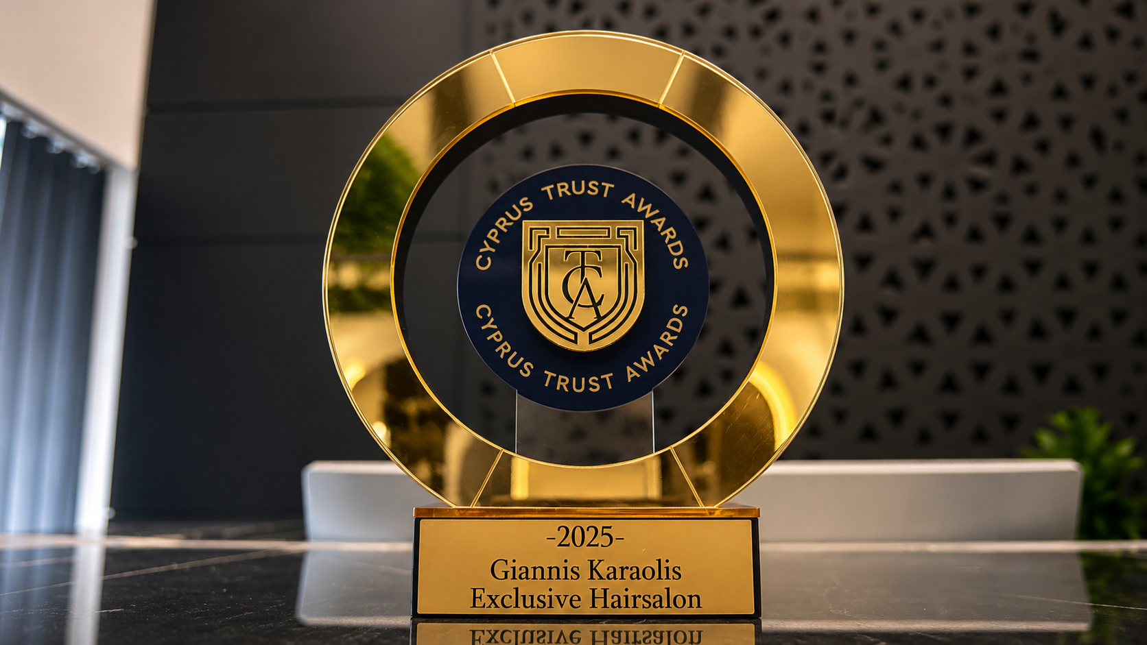 Cyprus Trust Awards 2025 gold ring trophy awarded to Giannis Karaolis Exclusive Hairsalon